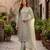 Sea green net embroidered salwaar kameez