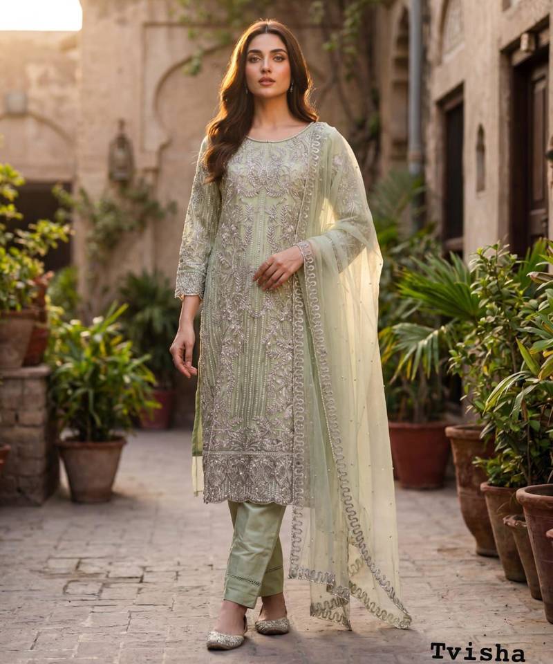 Sea green net embroidered salwaar kameez