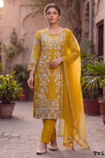 Yellow net embroidered salwaar kameez