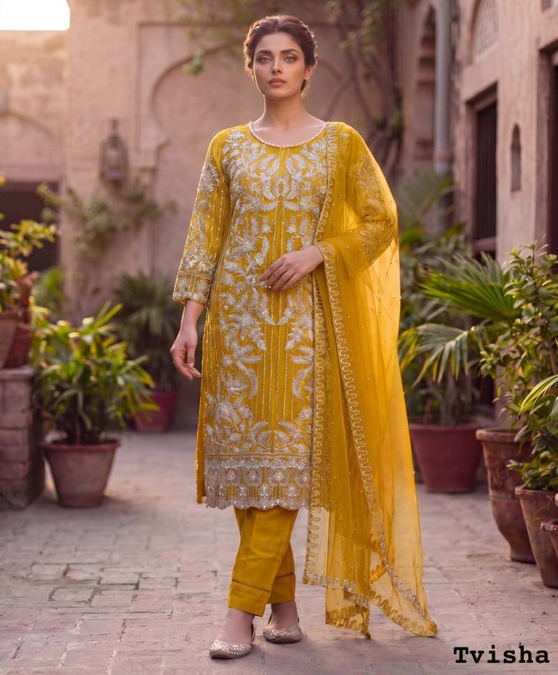 Yellow net embroidered salwaar kameez