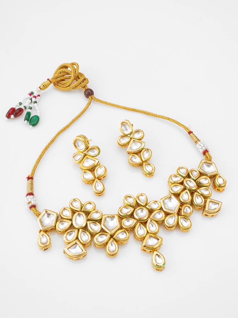 gold toned heavy kundan set