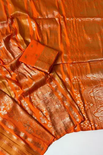orange tassels on pallu with flower georgette saree