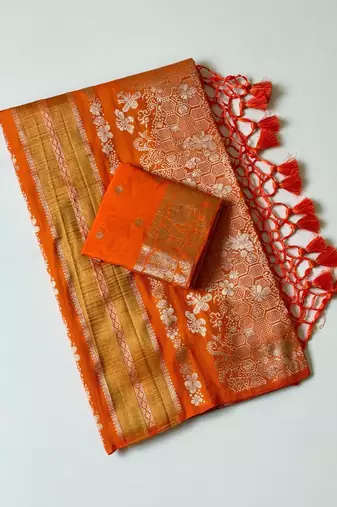 orange tassels on pallu with flower georgette saree