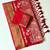 red tassels on pallu with flower georgette saree
