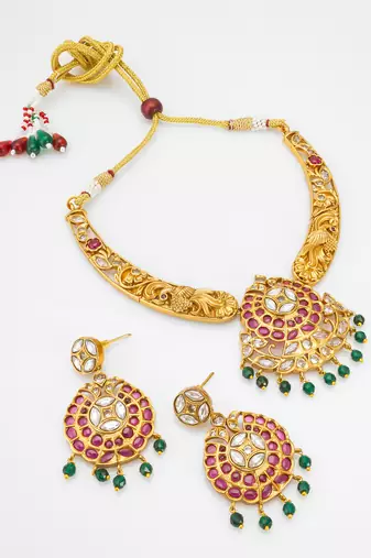 gold toned floral pendant set