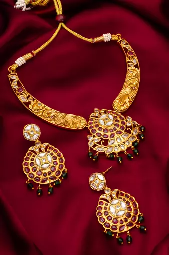 gold toned floral pendant set
