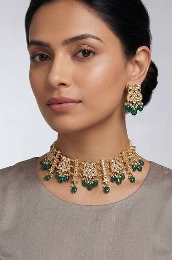 Gold plated kundan green stones choker set