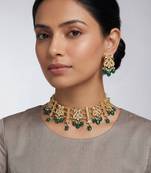 Gold plated kundan green stones choker set