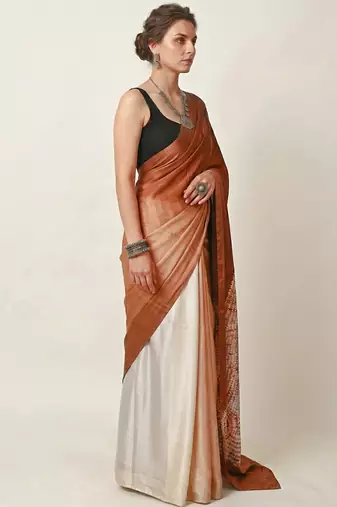 Rust printed satin saree with blouse piece
