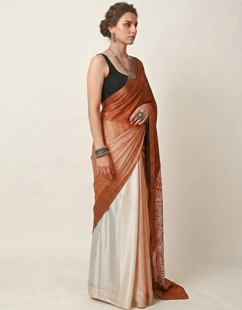 Rust printed satin saree with blouse piece