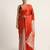 Orange printed satin saree with blouse piece