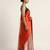Orange printed satin saree with blouse piece