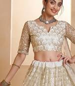 Off White Net Zari Embroidered Sequins Beads Lehenga Wedding Wear