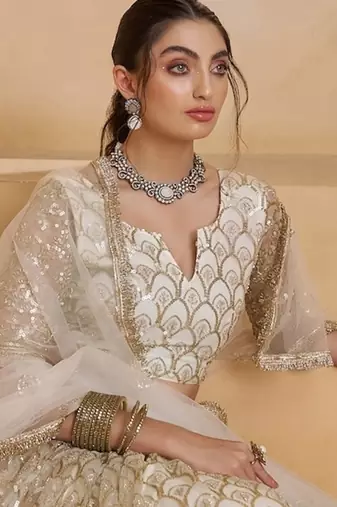 Off White Net Zari Embroidered Sequins Beads Lehenga Wedding Wear