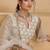 Off White Net Zari Embroidered Sequins Beads Lehenga Wedding Wear