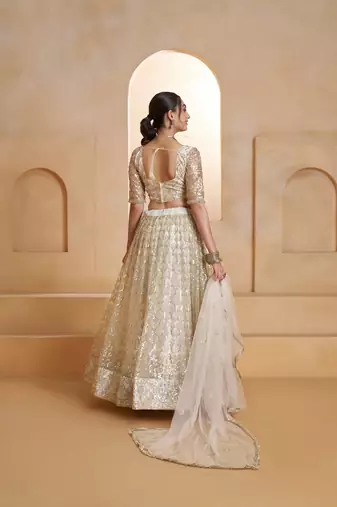 Off White Net Zari Embroidered Sequins Beads Lehenga Wedding Wear