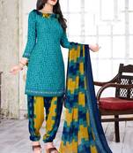 Tarquoise crepe printed unstitched dress material