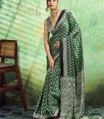 green faux satin print saree