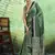 green faux satin print saree