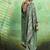green faux satin print saree