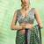 green faux satin print saree