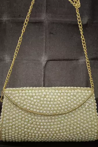 Pearl brass metal clutch