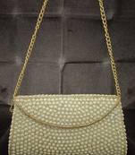Pearl brass metal clutch