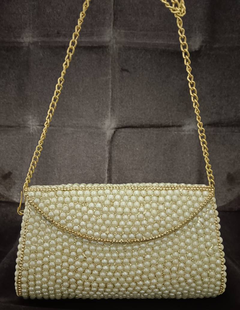 Pearl brass metal clutch
