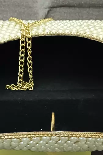Pearl brass metal clutch