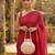 Elegant cream peach pearl embroidered potli bag with beaded handle