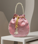 Elegant light pink peach pearl embroidered potli bag with beaded handle