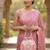 Elegant light pink peach pearl embroidered potli bag with beaded handle
