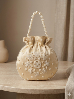 Elegant cream peach pearl embroidered potli bag with beaded handle 2