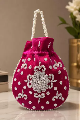 Luxury rani pearl embroidered potli bag with beaded handle     bridal & festive clutch