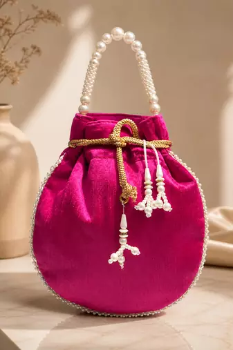 Elegant rani pearl embroidered potli bag with beaded handle