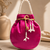 Elegant rani pearl embroidered potli bag with beaded handle
