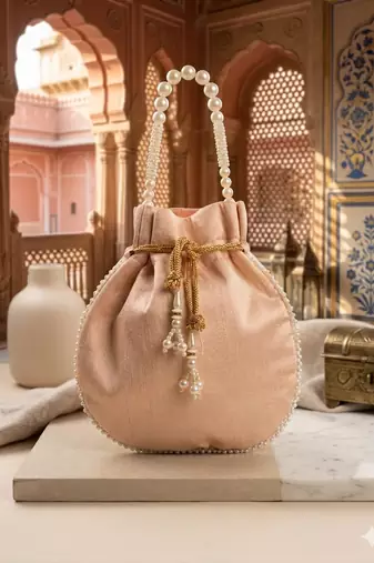Luxury pastel peach pearl embroidered potli bag with beaded handle     bridal & festive clutch