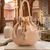 Luxury pastel peach pearl embroidered potli bag with beaded handle – bridal & festive clutch
