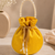 Luxury yellow pearl embroidered potli bag with beaded handle – bridal & festive clutch