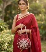 Elegant maroon pearl embroidered potli bag with beaded handle