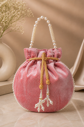 Elegant pastel pink pearl embroidered potli bag with beaded handle