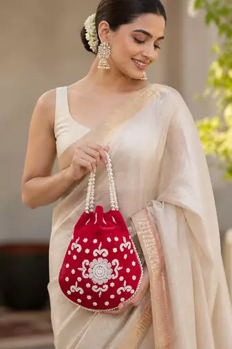 Luxury red pearl embroidered potli bag with beaded handle     bridal & festive clutch