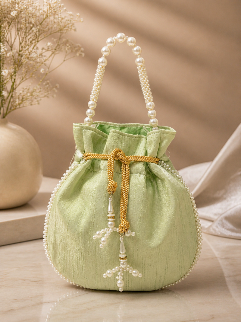 Elegant pastel green pearl embroidered potli bag with beaded handle
