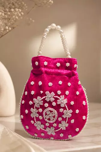 Elegant rani pearl embroidered potli bag with beaded handle
