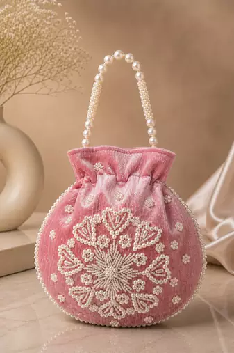 Elegant pastel pink pearl embroidered potli bag with beaded handle