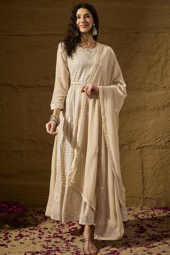 Cream faux georgette stitched gown with lace dupatta full sleeve embroidered