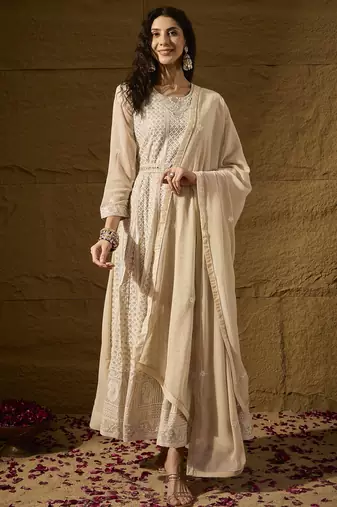 Cream faux georgette stitched gown with lace dupatta full sleeve embroidered