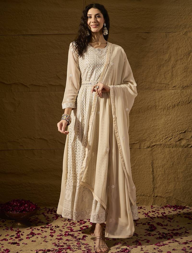 Cream faux georgette stitched gown with lace dupatta full sleeve embroidered