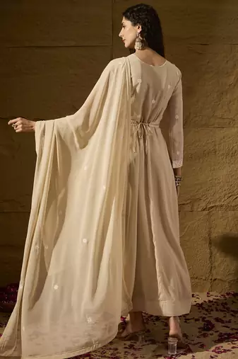 Cream faux georgette stitched gown with lace dupatta full sleeve embroidered