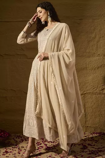 Cream faux georgette stitched gown with lace dupatta full sleeve embroidered